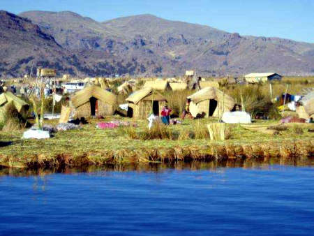 Lake Titicaca where the people move their homes monthly to replenish their floating island.