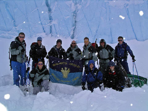 Greenland - Team below a stranded ice berg