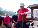 Dolomite Dragon/SSgt Abbott teaches relevant mountaineering knots to the team members.