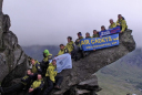 Operation Hush/The group on the Canon on Tryfan with the banners