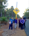 DoE Australia/Stopping for a quick pose with the local road signage