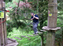Phoenix Lakes/Spr Bowman negotiating one of the rope bridges on the Go Ape course
