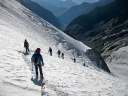 Blue Ecrins/The climbing team descends as a unit to minimize danger on the glacial descent from the Tet Sud du Replat