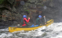 Ja Strokers/Paddling one of the many sets of rapids encountered