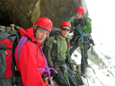 Peruvian Cat/L-R LCpl Bayliss, Spr Roslyn and Cpl AHara sheltering under a huge boulder on descent from Copa