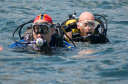 Submerged Battlefield/Tony Overbury and Tony Hughes return from their dive on HMS Maori in Valetta Harbour