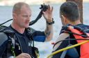 Submerged Battlefield/Dave Richards runs through his pre-dive checks with Paul Humphrey
