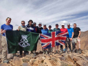 Cockney Toubkal/Holding up our flags at another summit