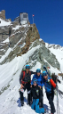 Northern Valais Dragon/Team on Col de Bertol with refuge behind